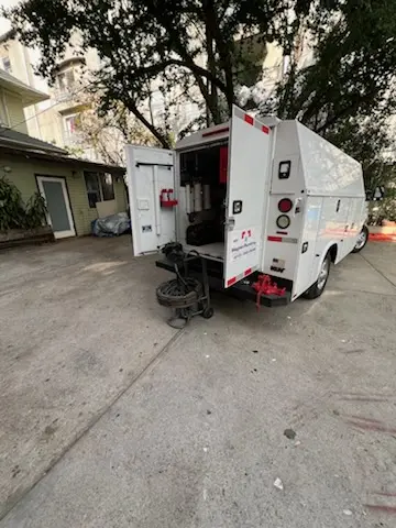 Magnet Plumbing service vehicle on-site for Grease Trap Cleaning in San Remo